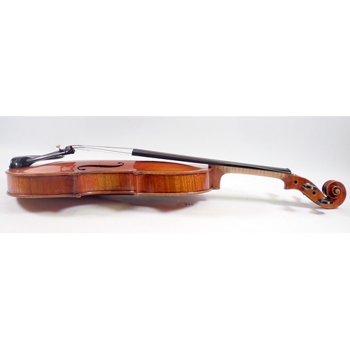 915 - An early 20th century hand made violin in fitted case, 14