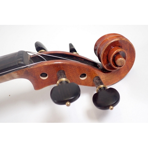 915 - An early 20th century hand made violin in fitted case, 14