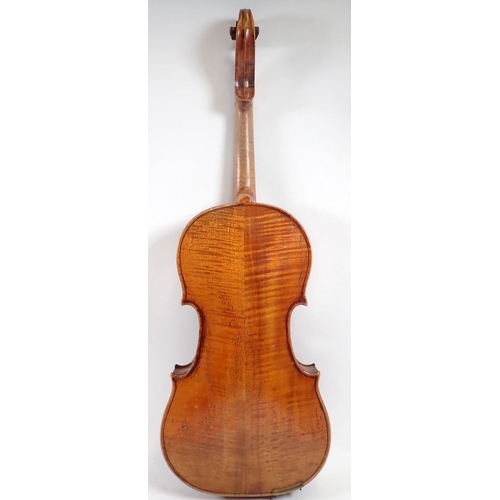 916 - A late 19th century German violin in the style of Stradivarius with two bows in fitted case, violin ... 