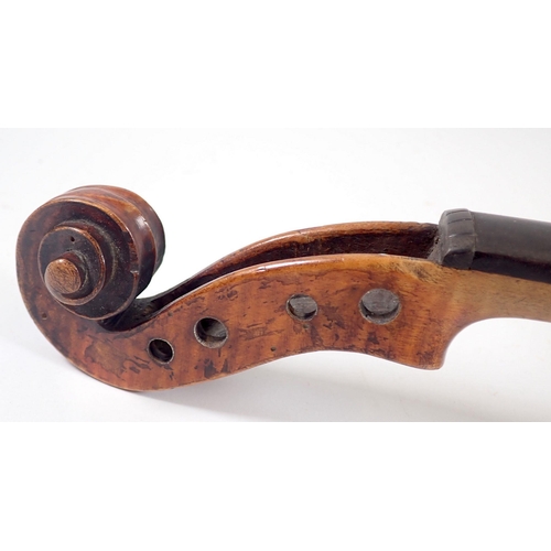 916 - A late 19th century German violin in the style of Stradivarius with two bows in fitted case, violin ... 