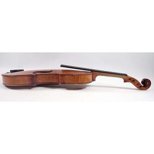 916 - A late 19th century German violin in the style of Stradivarius with two bows in fitted case, violin ... 