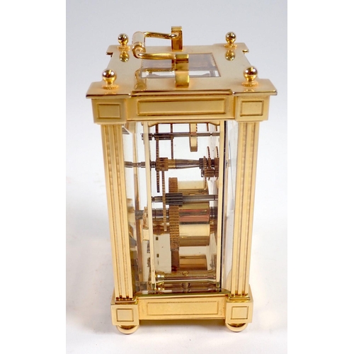 923 - A Jens Olsen brass 8 day carriage clock 12.5cm tall