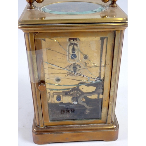 926 - A brass carriage clock, 11cm tall, rear glass panel a/f