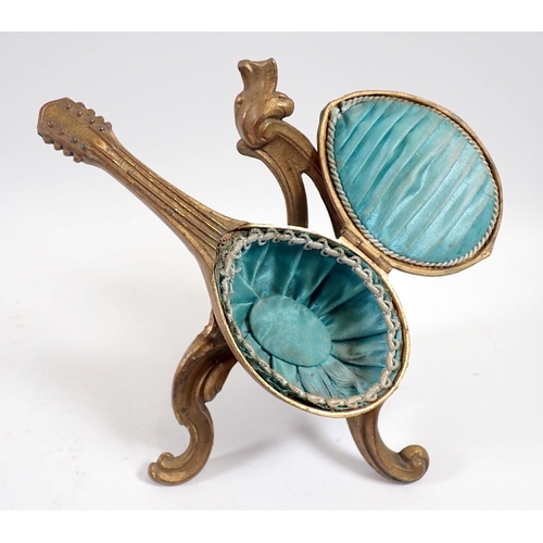 929 - An early 20th century novelty metal trinket box in the form of a mandolin on scrollwork stand