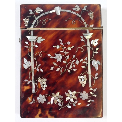 940 - A 19th century tortoiseshell and mother of pearl card case decorated archway with flowers and bird, ... 