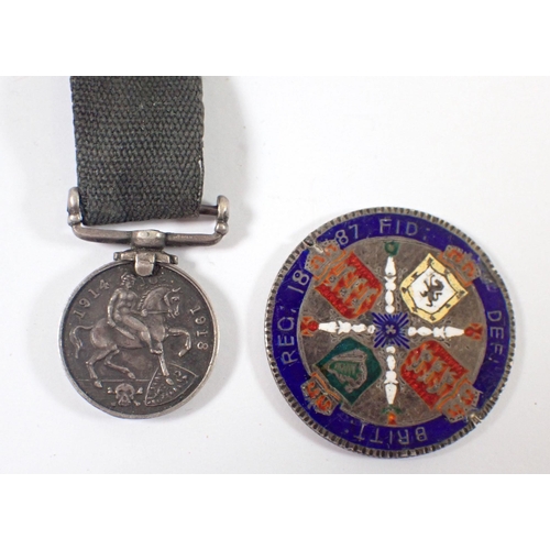 952 - A WWI war medal miniature, two lockets, medallions etc.