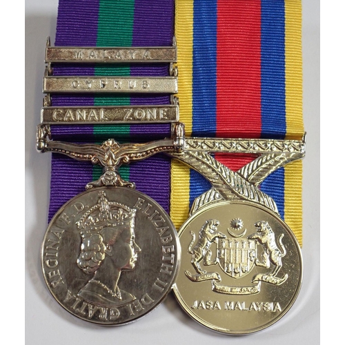 953 - An Elizabeth II General Service medal with three bars, Malaya, Cyprus and Canal Zone, to 22823239 Pt... 