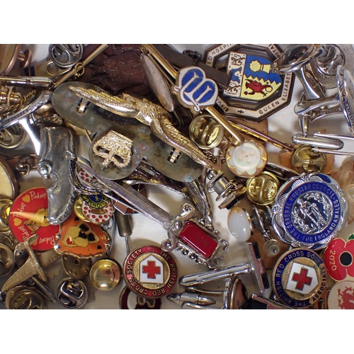 956 - A box of badges and pins etc