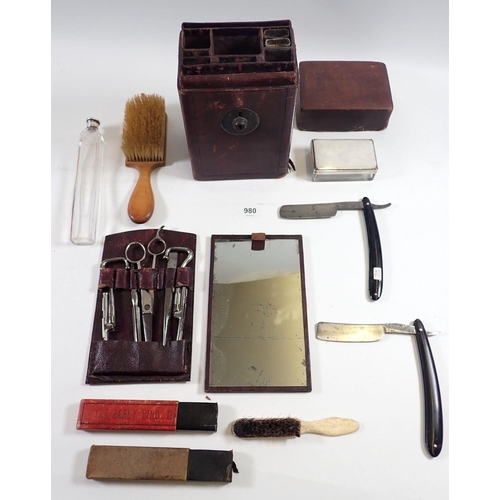 980 - An Edwardian gentleman's travelling leather shaving case and contents including mirror, razors, butt... 