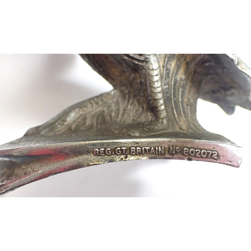 988 - An early 20th century metal Art Deco cockerel car mascot with registration mark, 11cm long