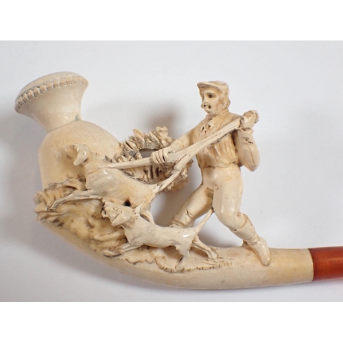 996 - A 19th century meerschaum pipe carved in the form of a huntsman and hounds, 13cm