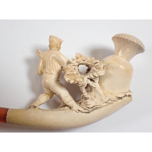 996 - A 19th century meerschaum pipe carved in the form of a huntsman and hounds, 13cm