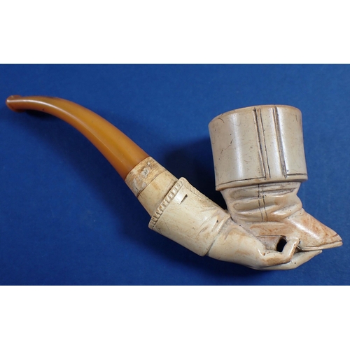 998 - A 19th century meerschaum pipe carved in the form of a hand holding a boot, in fitted case, 15cm