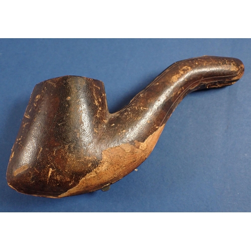 998 - A 19th century meerschaum pipe carved in the form of a hand holding a boot, in fitted case, 15cm