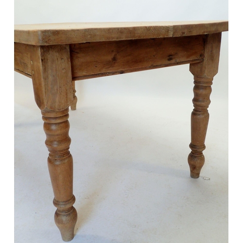 1146 - A pine scrub top kitchen dining table on turned leg supports, 183 x 91.5cm wide x 78cm high