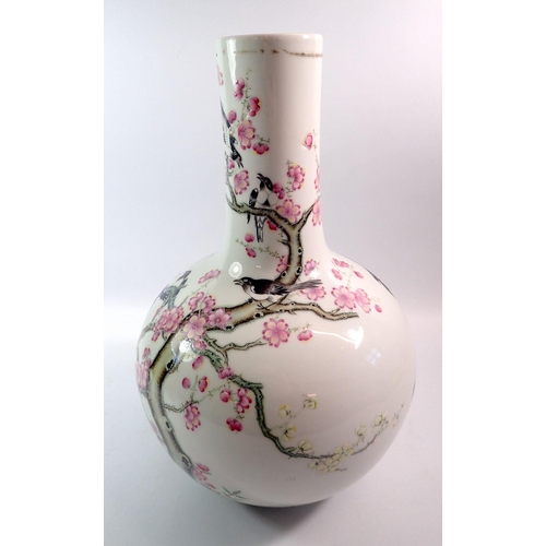 120 - A Chinese large bulbous vase painted birds and blossom, repaired to neck 40cm