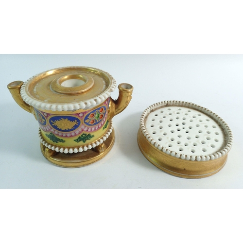 152 - A 19th century porcelain inkwell painted oval reserves on a yellow ground with pierced borders, all ... 