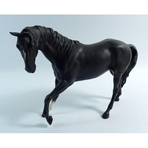 158 - A Beswick black matt horse, 18cm tall