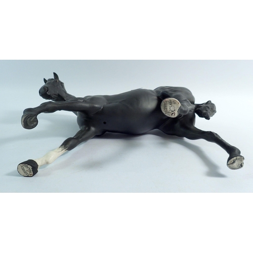 158 - A Beswick black matt horse, 18cm tall