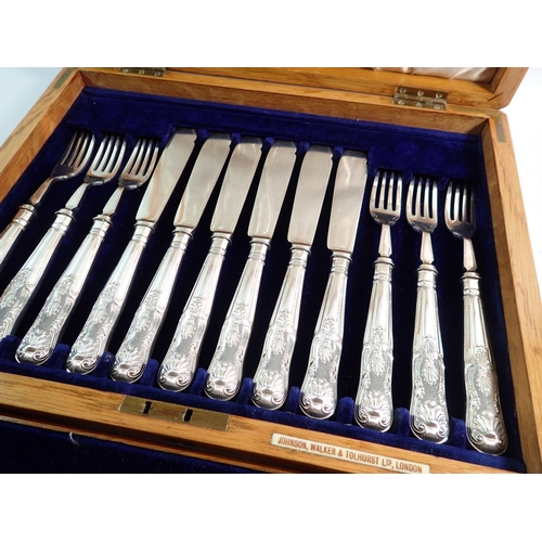 209 - An Edwardian silver plated six place setting fish cutlery and fruit cutlery set with embossed decora... 