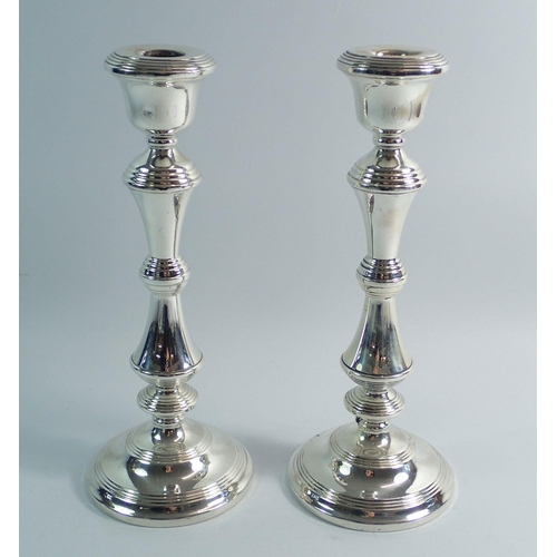 228 - A pair of silver candlesticks, Birmingham 1961, W I Broadway & Co, 26cm