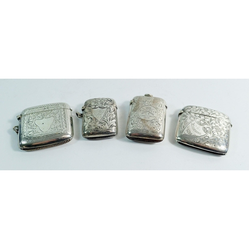 243 - Four silver vesta cases with engraved decoration, 117g