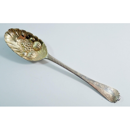 244 - A pair of Queen Anne Britannia silver tablespoons later embossed fruit as berry spoons, cased, 117g