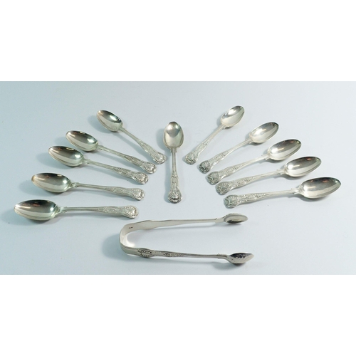 247 - A set of eleven Kings Pattern teaspoons and a pair of tongs, London 1887 by Josiah Williams & Co, 31... 