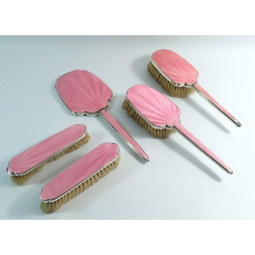 256 - A five piece silver and pink enamel dressing table set, Birmingham 1937 - some a/f