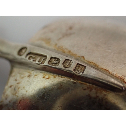 282 - A silver caddy spoon with mother of pearl handle, Birmingham 1832 by George Unite