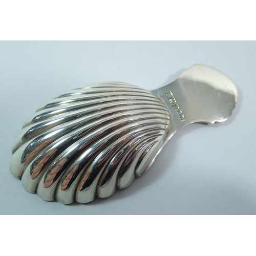 284 - A silver caddy spoon with shell handle and bowl, Birmingham 1967 by S J Rose