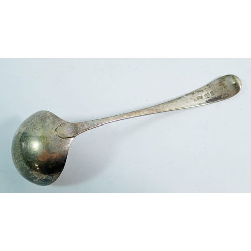 295 - A Scottish silver cream ladle with engraved crest and motto, Edinburgh circa 1800 by AC, 12.5cm