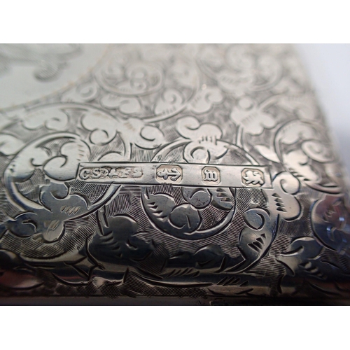 302 - A Victorian silver cigarette case with all over engraved scrollwork decoration and monogram, Birming... 