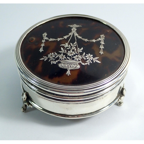 307 - A Mappin & Webb silver and tortoiseshell circular dressing table box, Birmingham 1911, 7.5cm diamete... 