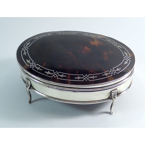 309 - A silver and tortoiseshell oval dressing table box, by E S Barnsley & Co, Birmingham 1915, 15 x 11cm