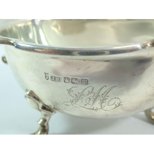 310 - A silver large sauce boat on three paw feet, 20cm, Sheffield 1904, Joseph Rodgers and Sons, 302.7g