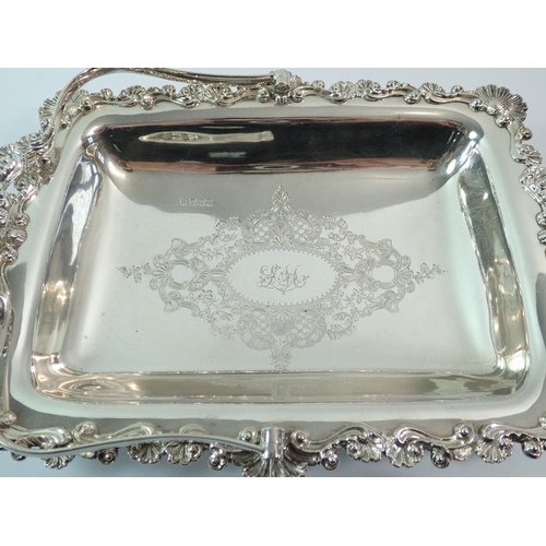 326 - A silver basket with applied shell border to edge and handle and engraved decoration to centre, Shef... 