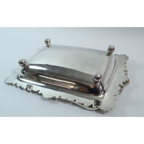 326 - A silver basket with applied shell border to edge and handle and engraved decoration to centre, Shef... 