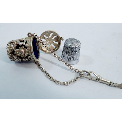 329 - A silver Art Nouveau chatelaine - the clip embossed female mask and flowers, Birmingham 1901 by Deak... 