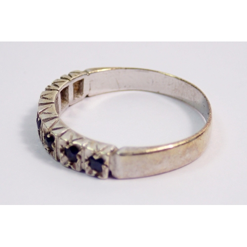 341 - A 9 carat gold sapphire set half eternity ring, size M, 2.2g