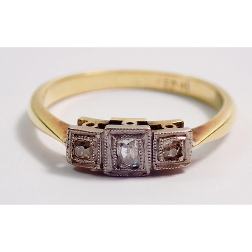 352 - An Art Deco 18 carat gold three stone diamond ring with square settings, size L. 2.5g - in original ... 