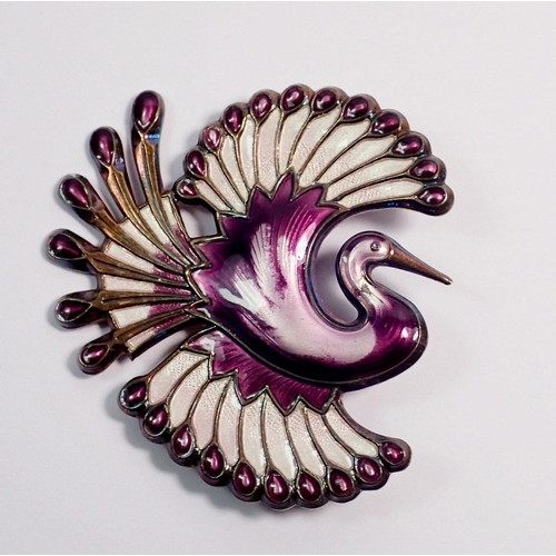 356 - A David Andersen Norwegian silver and purple enamel phoenix brooch, 5cm wide