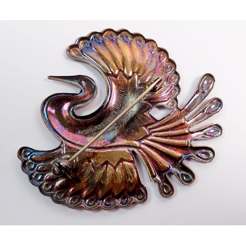 356 - A David Andersen Norwegian silver and purple enamel phoenix brooch, 5cm wide