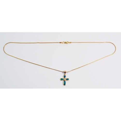 368 - A 14 carat gold and enamel crucifix, 1.5cm drop on 9 carat gold chain - chain 39cm, total weight 4.7... 