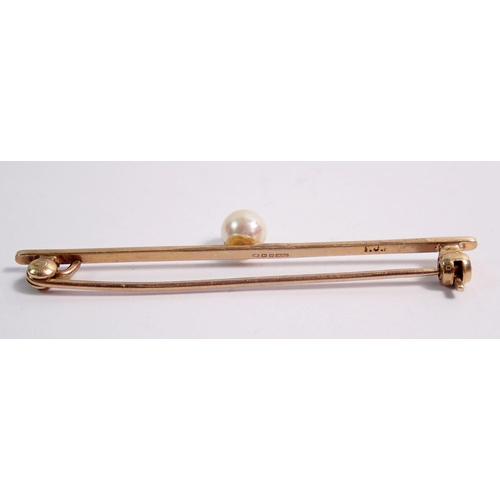 382 - A 9 carat gold bar brooch set pearl, 5cm, 2g