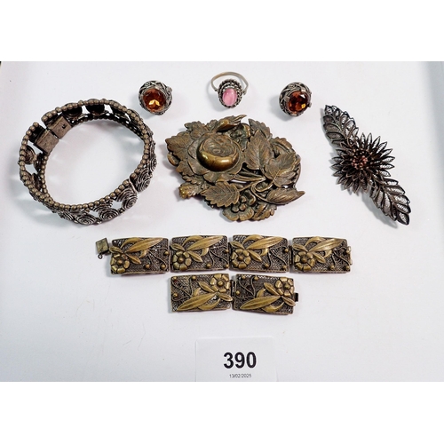 390 - A small box of costume jewellery