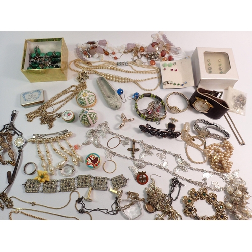 438 - A box of costume jewellery including malachite, paste etc.