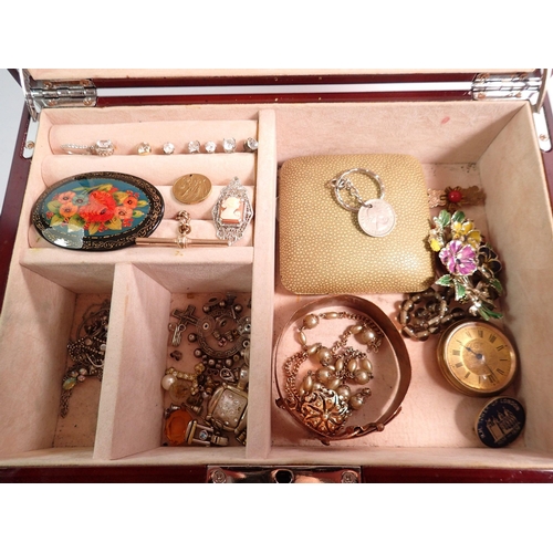 445 - A jewellery box with contents including earrings, brooches, bracelets etc