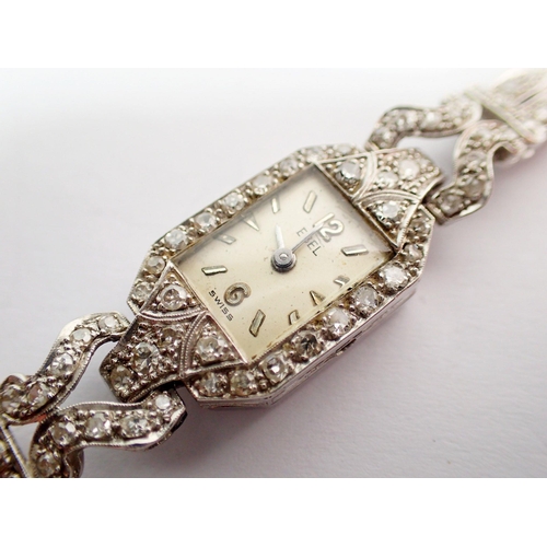 450 - An Ebel diamond set cocktail watch, dated 1933