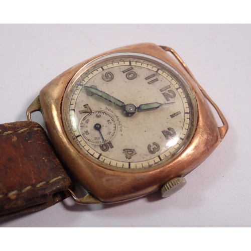 455 - A 9 carat rose gold gentleman's 1920s wrist watch